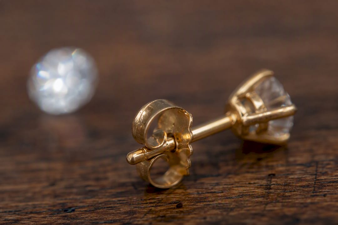 Push back butterfly style earring clasp close-up