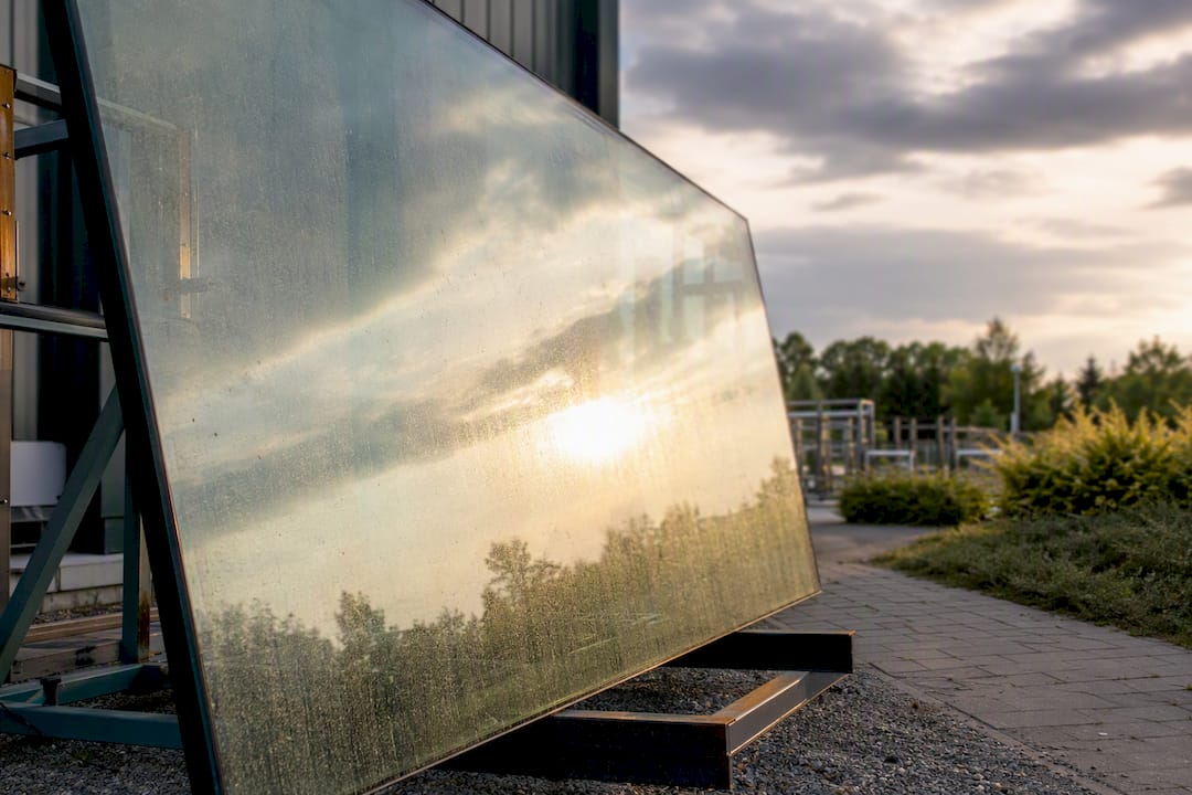 Outdoor glass panel showing glare scattering in sunlight