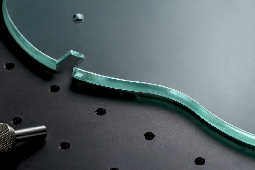 Crisp curved and straight waterjet glass edges
