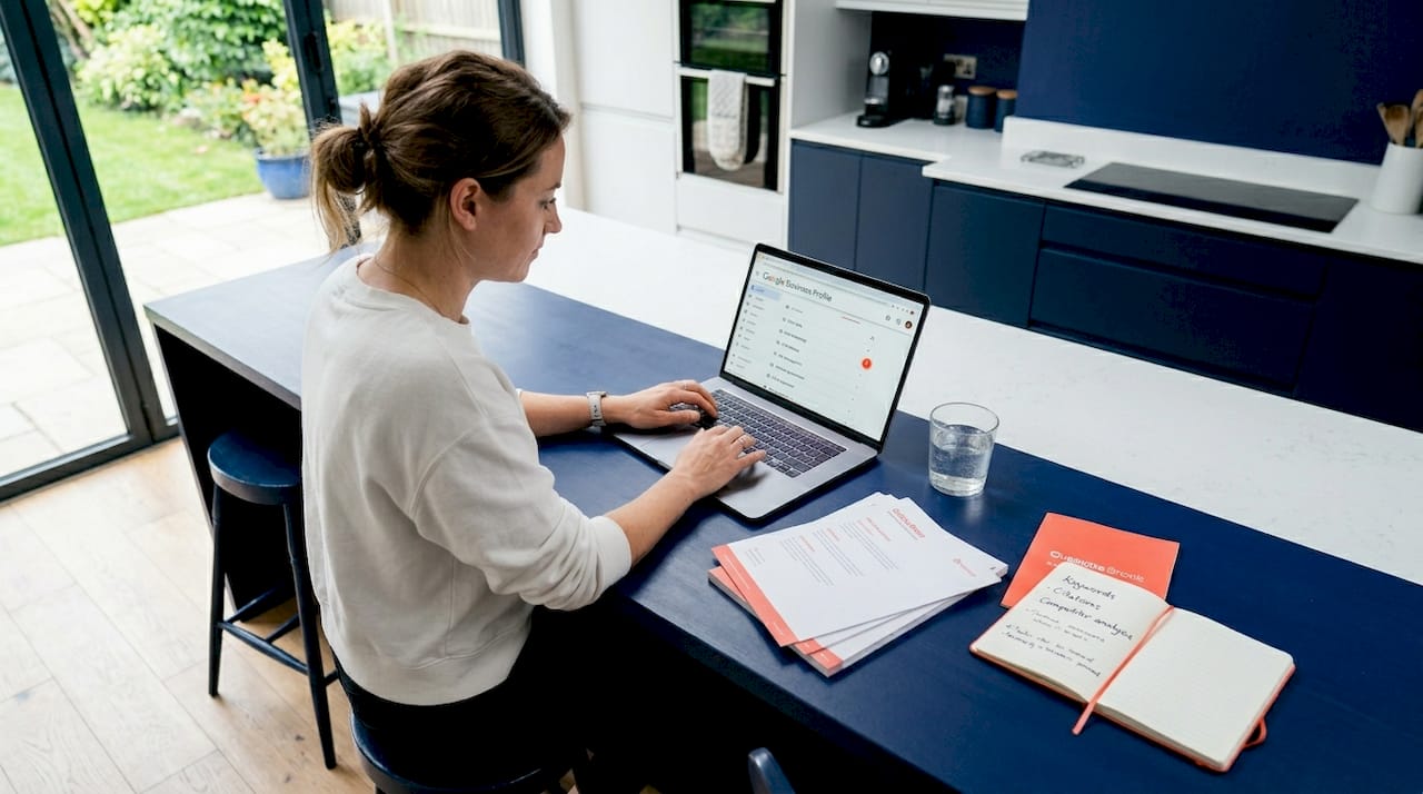 Manager listing company services in kitchen workspace