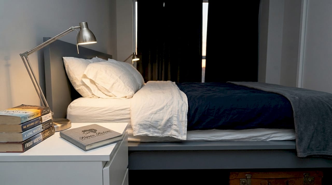 Furnished rental bedroom with quality linens
