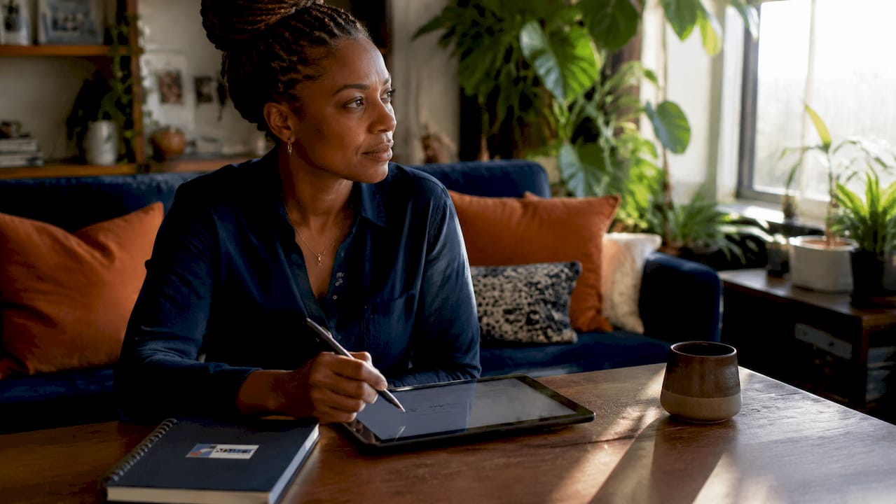 Woman designing real estate landing page headline