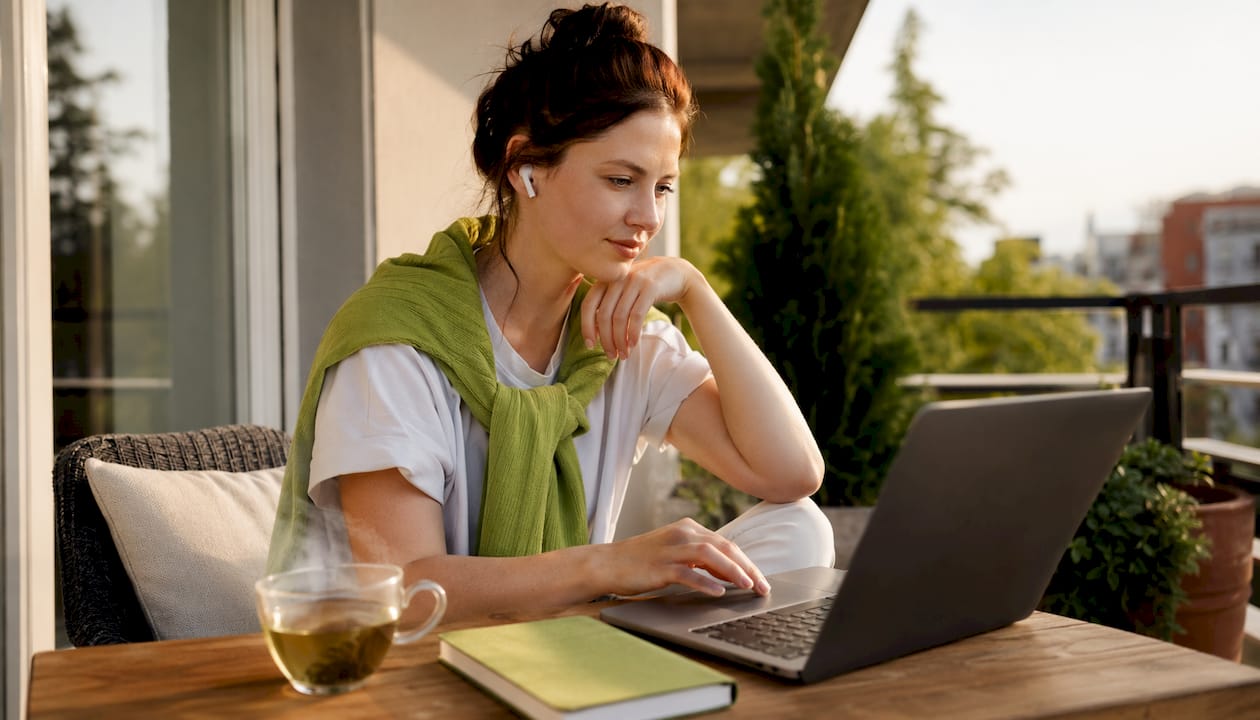 Woman in telehealth mental health session at home