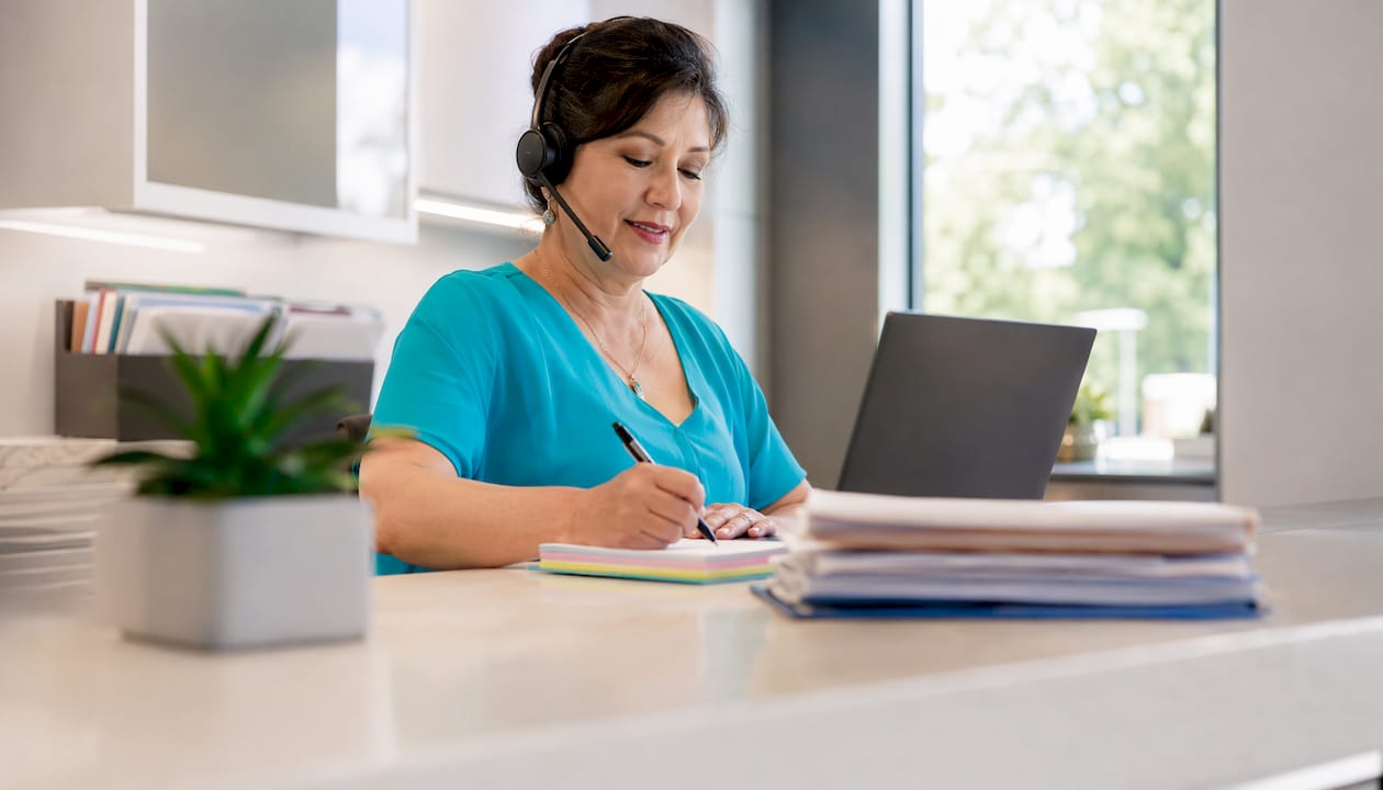 Dental clinic receptionist on phone call