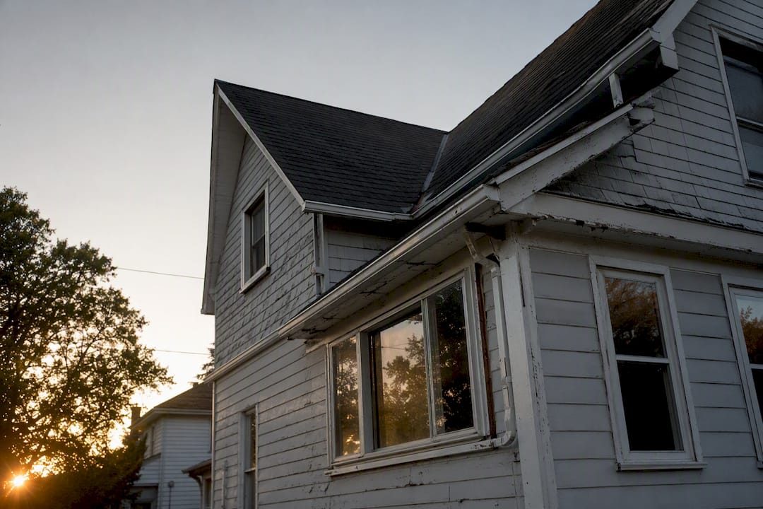 Residential home exterior showing property risk factors