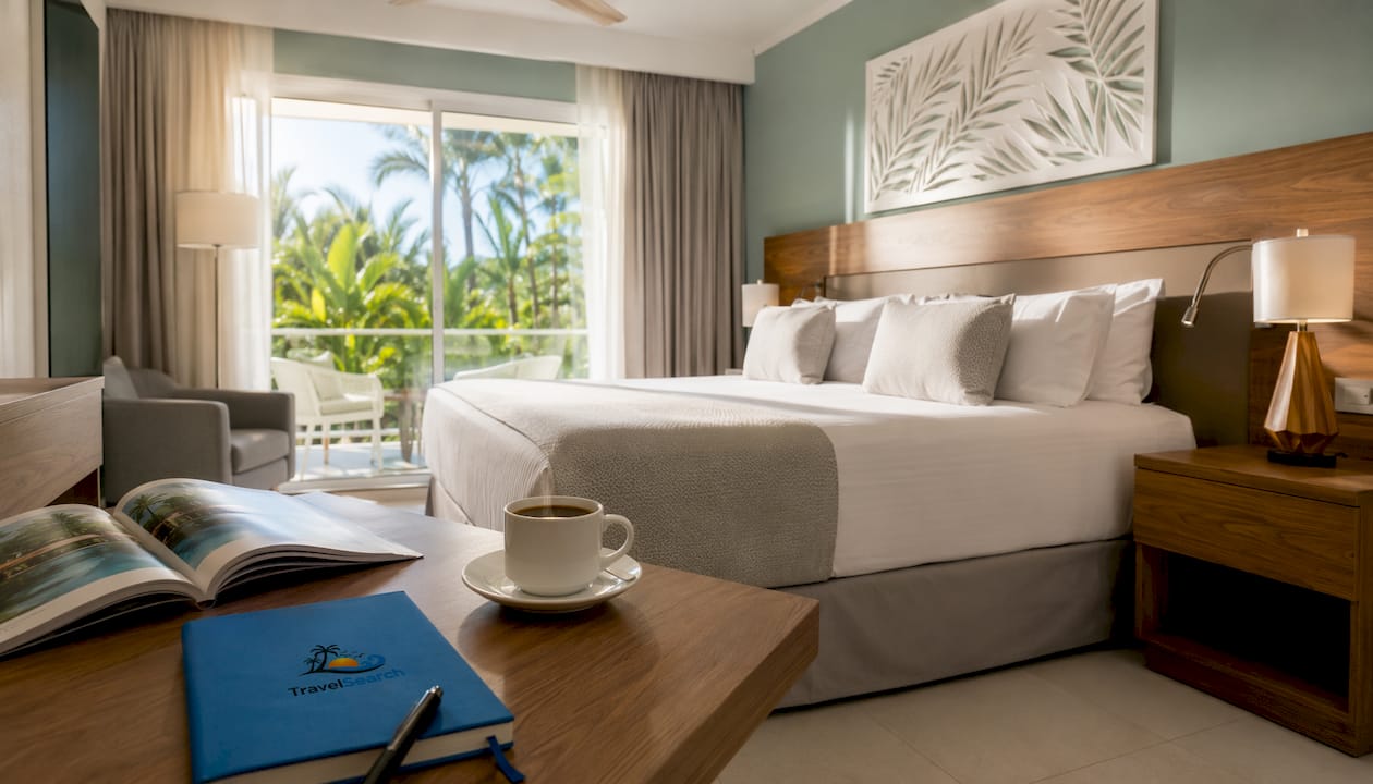 Hotel Riu Palace Bavaro: 2026 Review and Family Guide 3 Interior of renovated modern hotel room with balcony