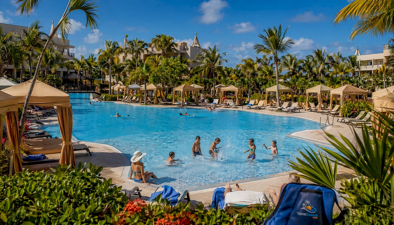 Families enjoying pool at Hotel Riu Funana