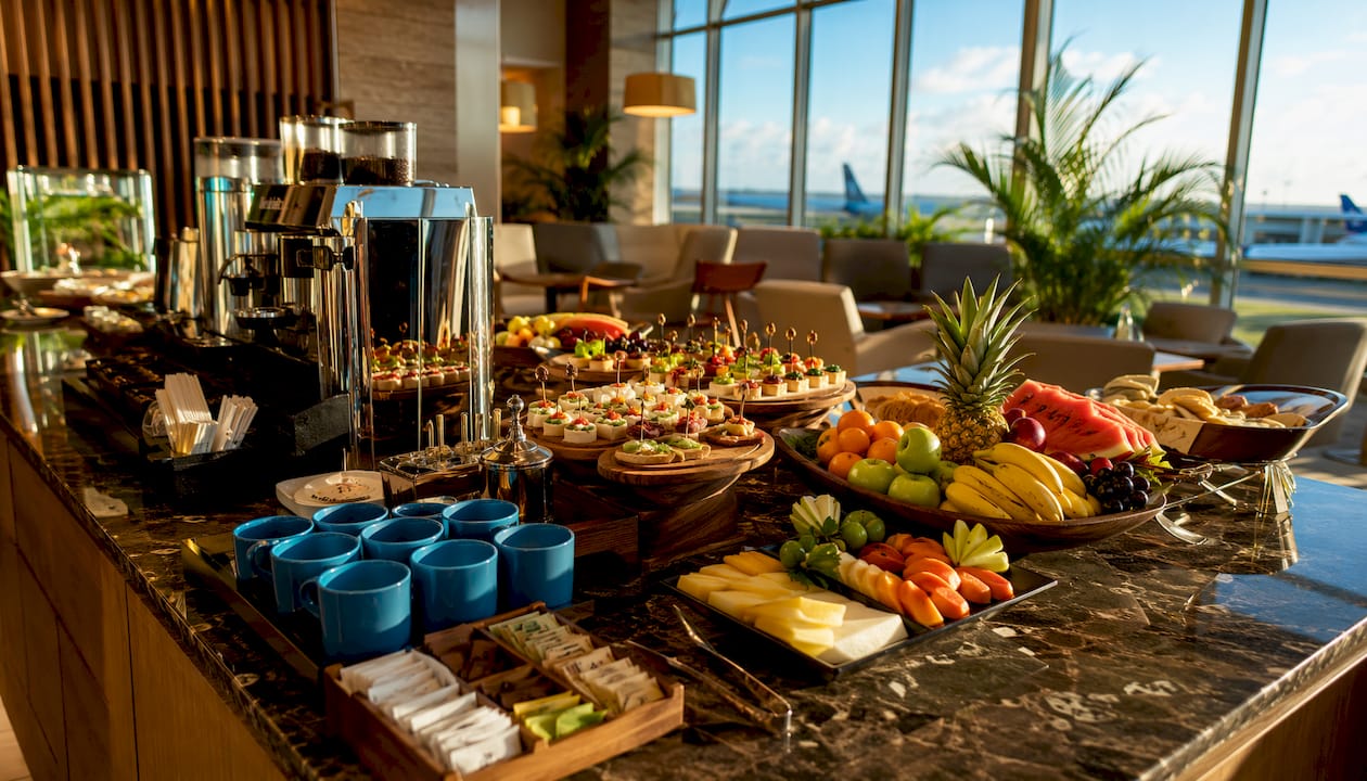 Buffet counter with snacks and coffee in Punta Cana VIP lounge