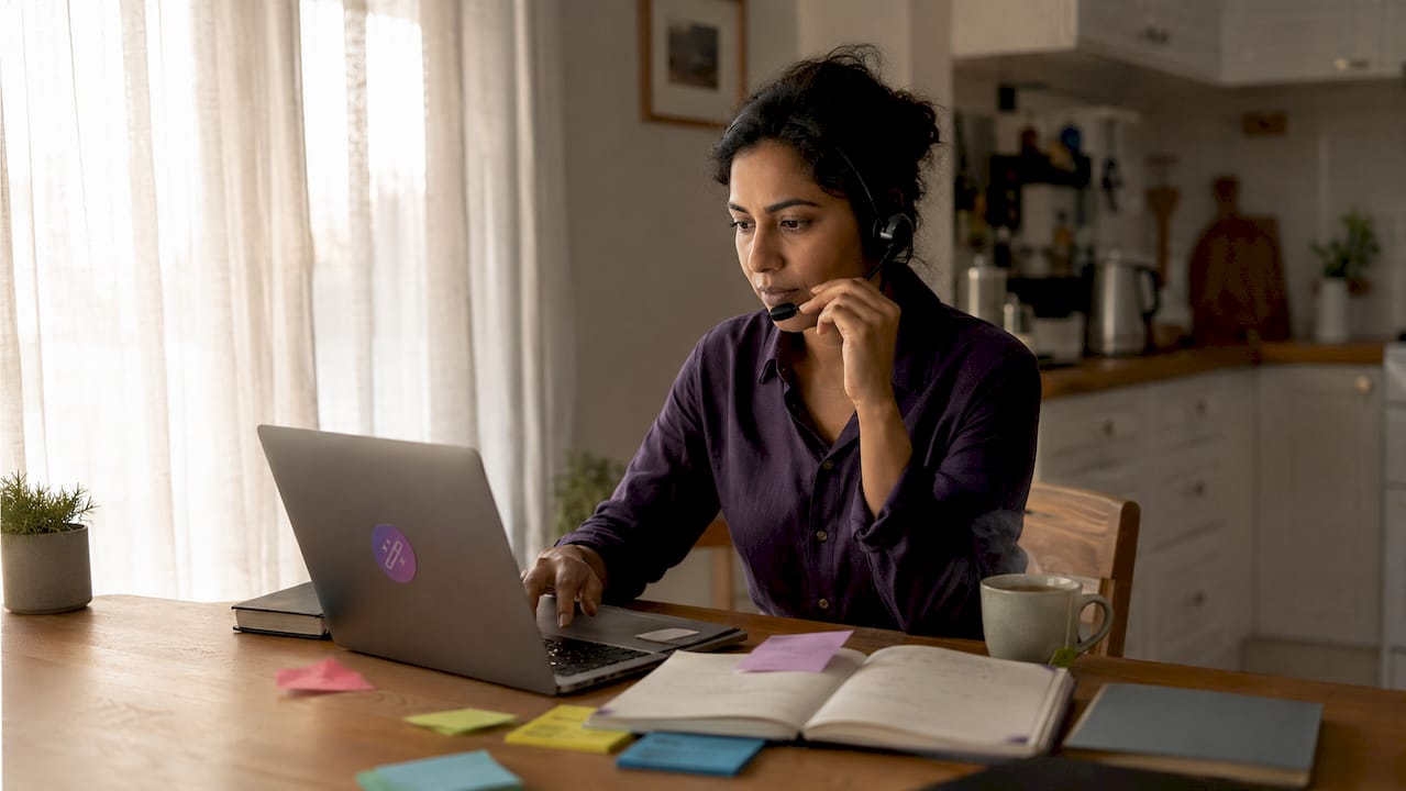 Woman at desk using job search automation tools