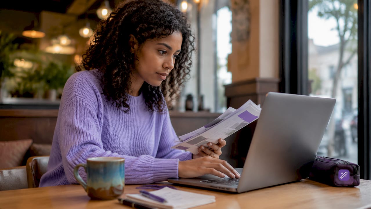 Student researching companies at desk