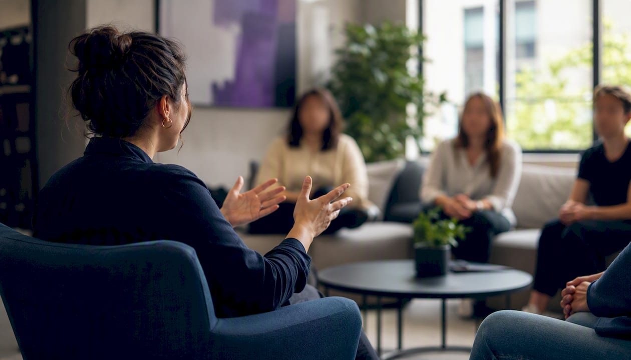 Market research analyst moderating focus group