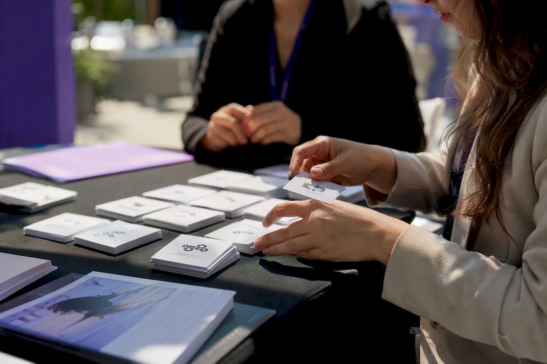 Recruiter hands arranging skill tokens on table
