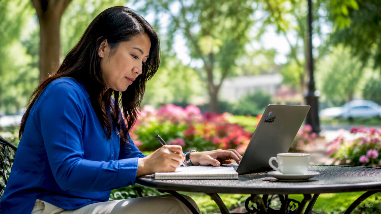 Woman configuring SEO tools at desk