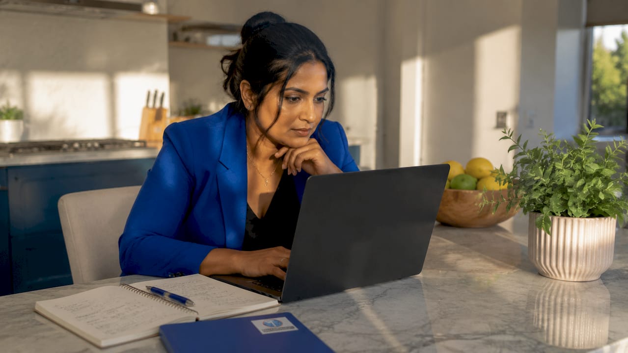 Woman working on ecommerce security at desk