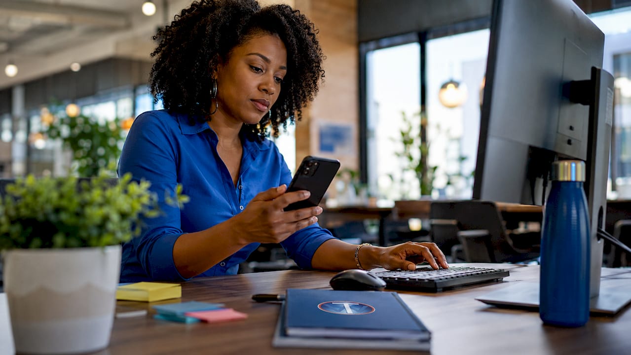 Person setting up multi-factor authentication on phone