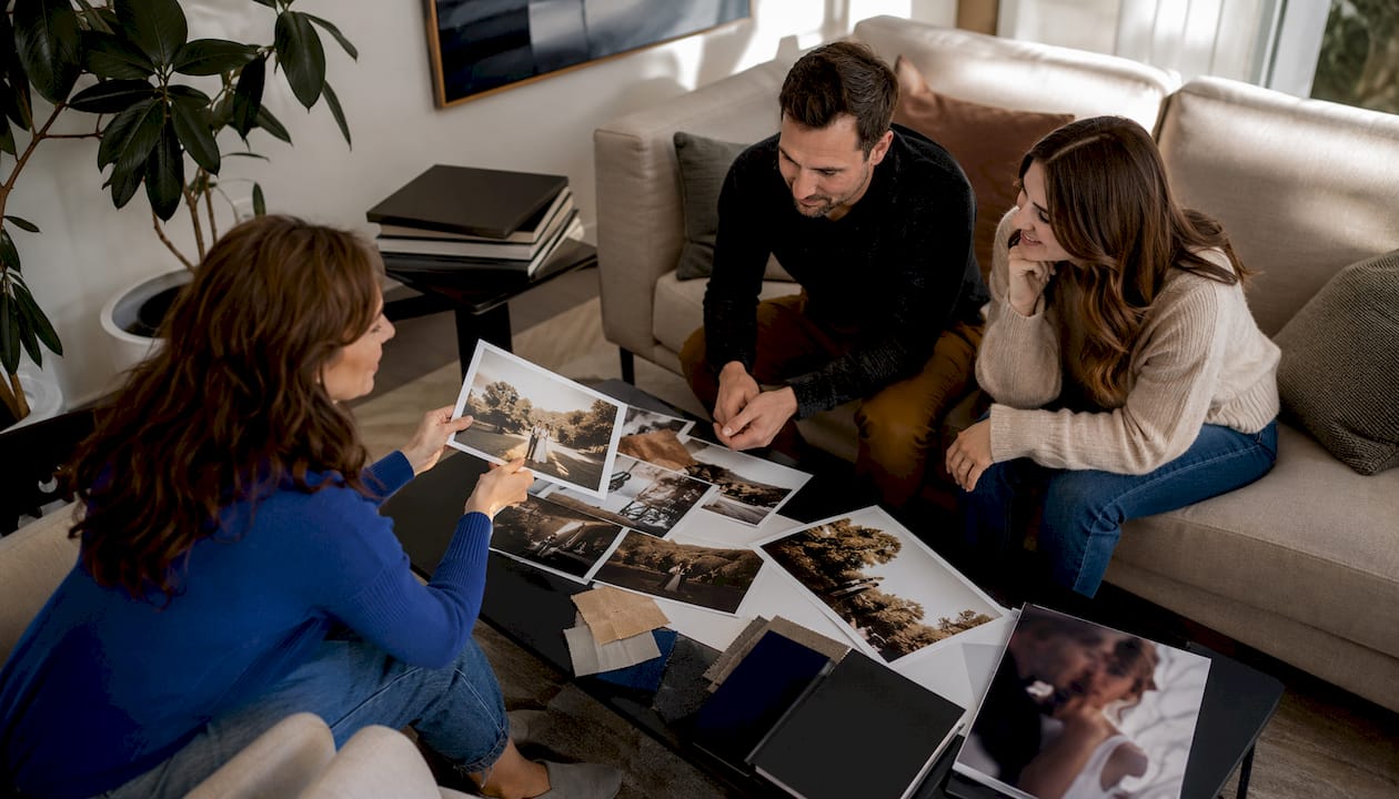 Photographer consulting couple during shoot planning