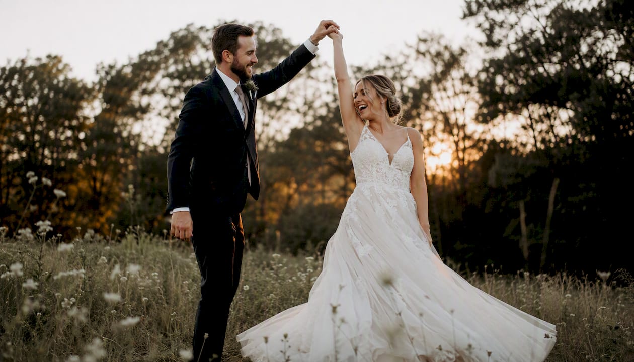 Golden hour candid couple laughing outdoors