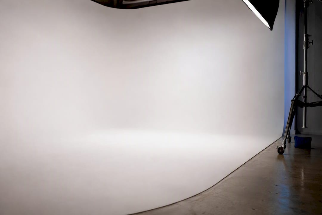 White cyclorama stage with seamless curved backdrop
