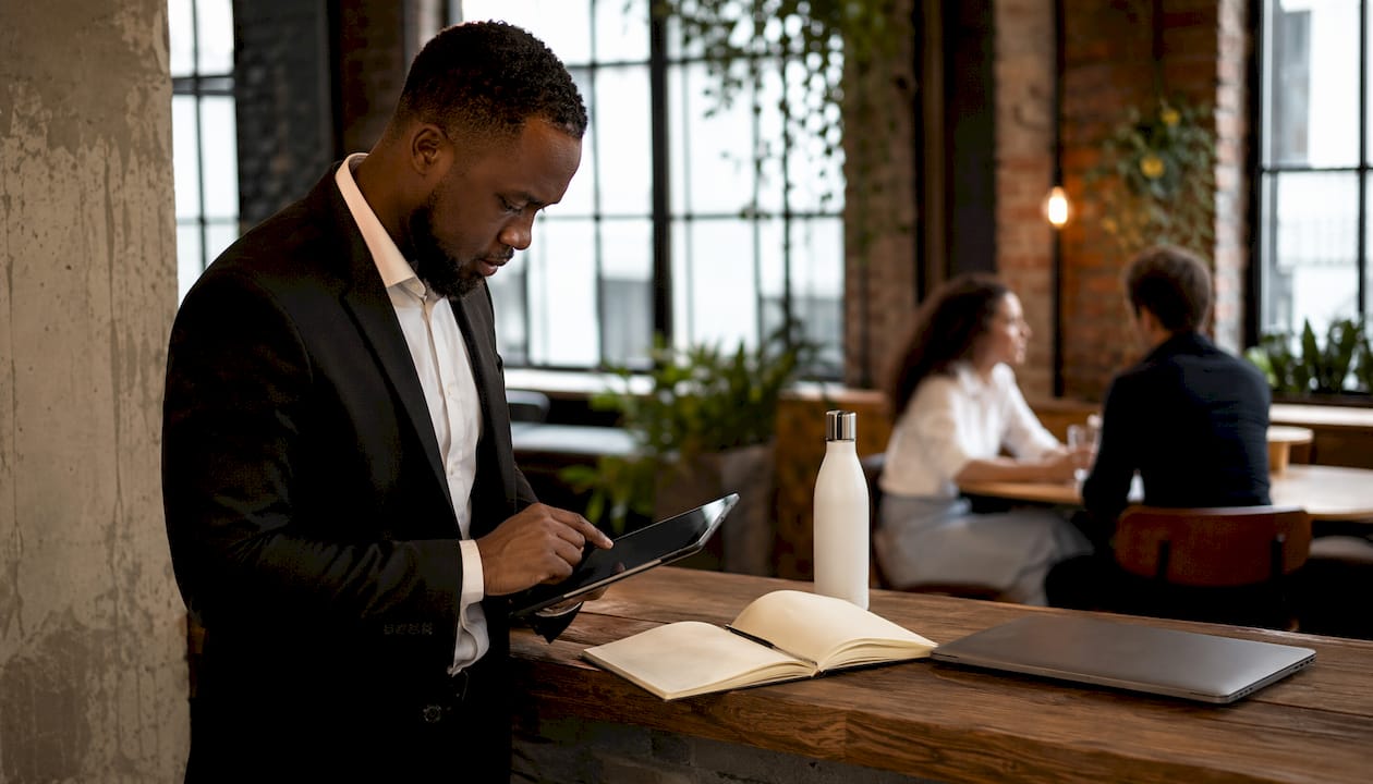 Hands using tablet for flexible marketing resources