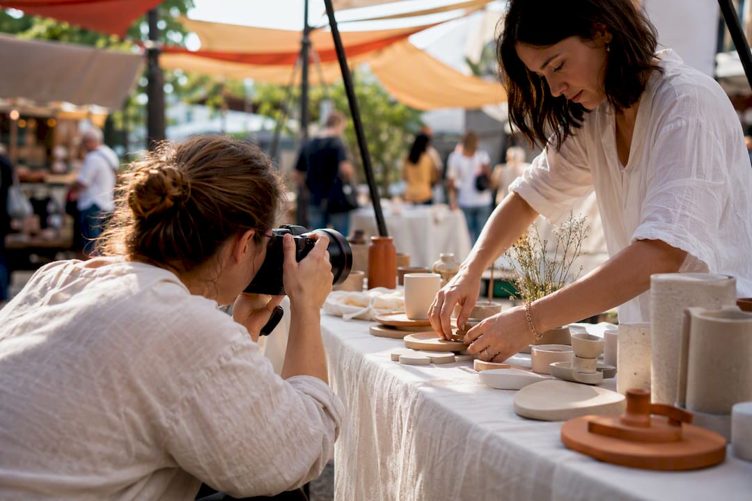 Photographer arranging product for business photo