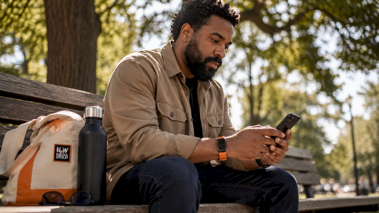 Business owner replying to reviews on smartphone