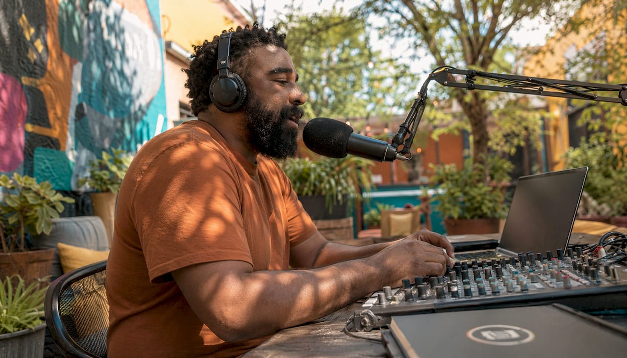 Radio host broadcasting at local community station