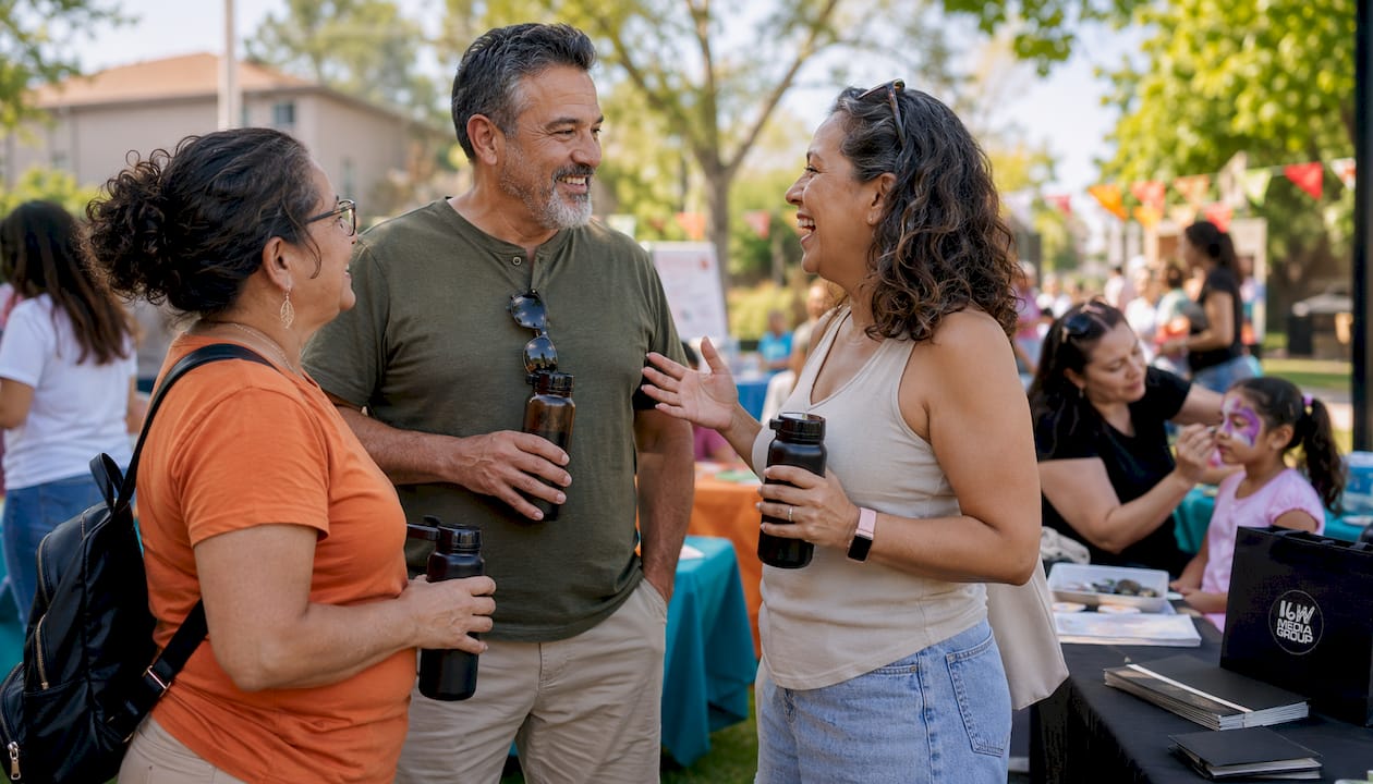 People engaging at local community event outdoors