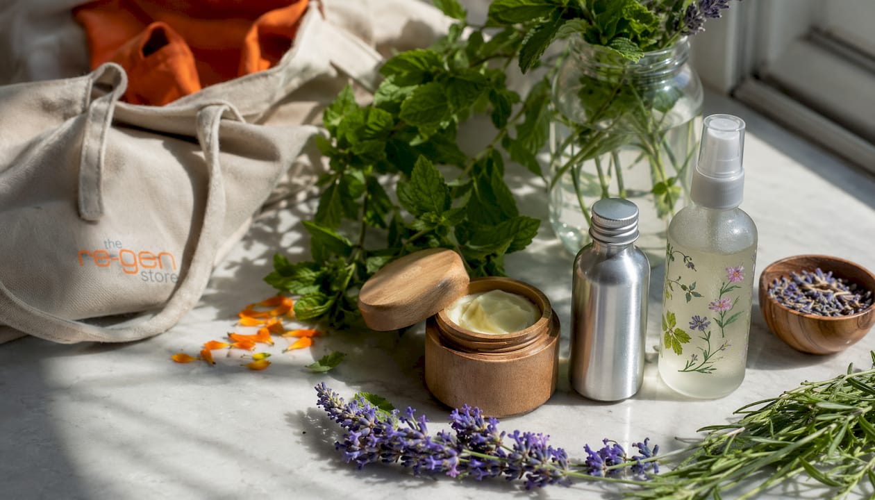 Flat lay of herbal skincare product varieties