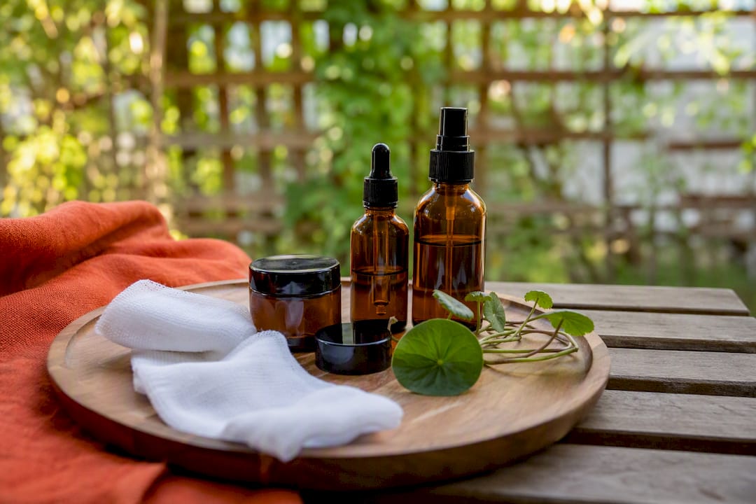 Post-surgical skincare setup with herbal products and gauze