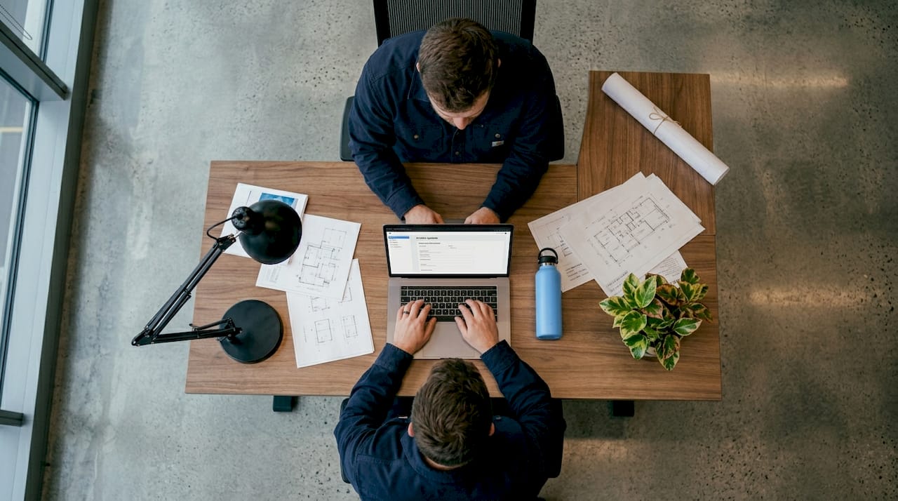 Contractor updating profile in home office