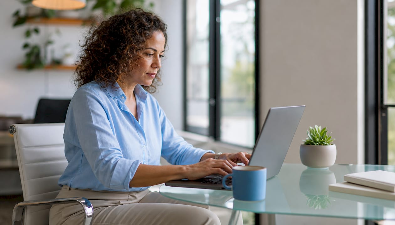 Professional woman optimizing Google Business Profile at desk
