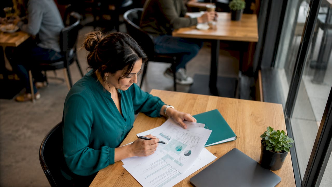 Property manager reviewing lease renewal costs