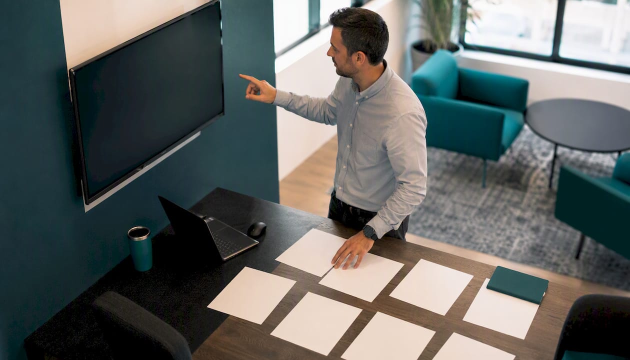 Leasing professional analyzing leasing data at desk