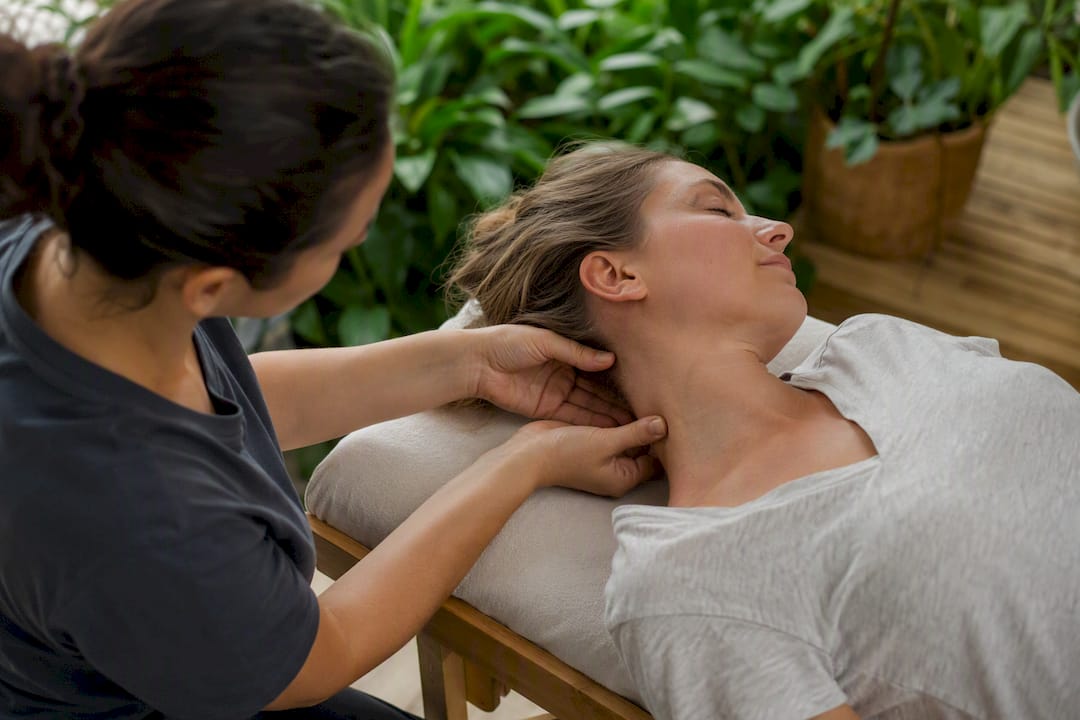Therapist performing neck manual therapy