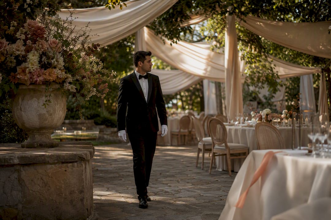 Event butler inspecting venue layout