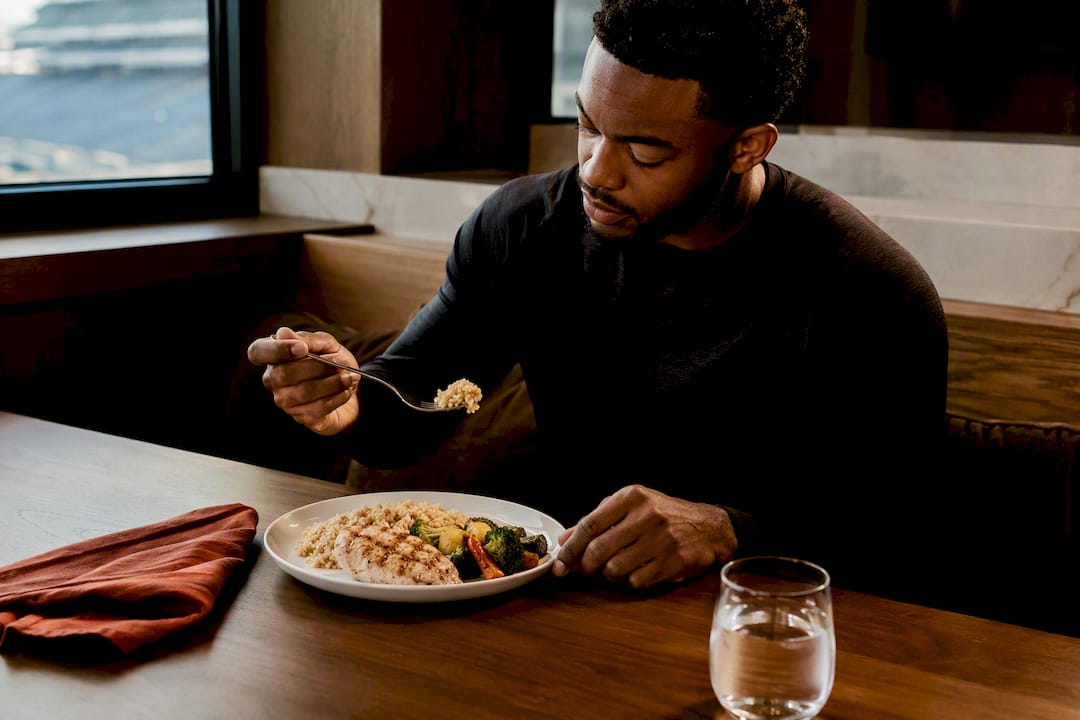 Athlete eating a balanced pregame meal