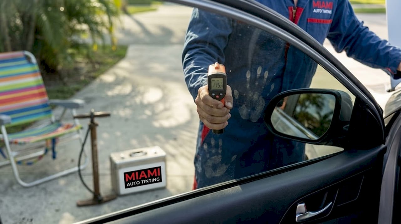 Mechanic demonstrates ceramic tint heat blocking