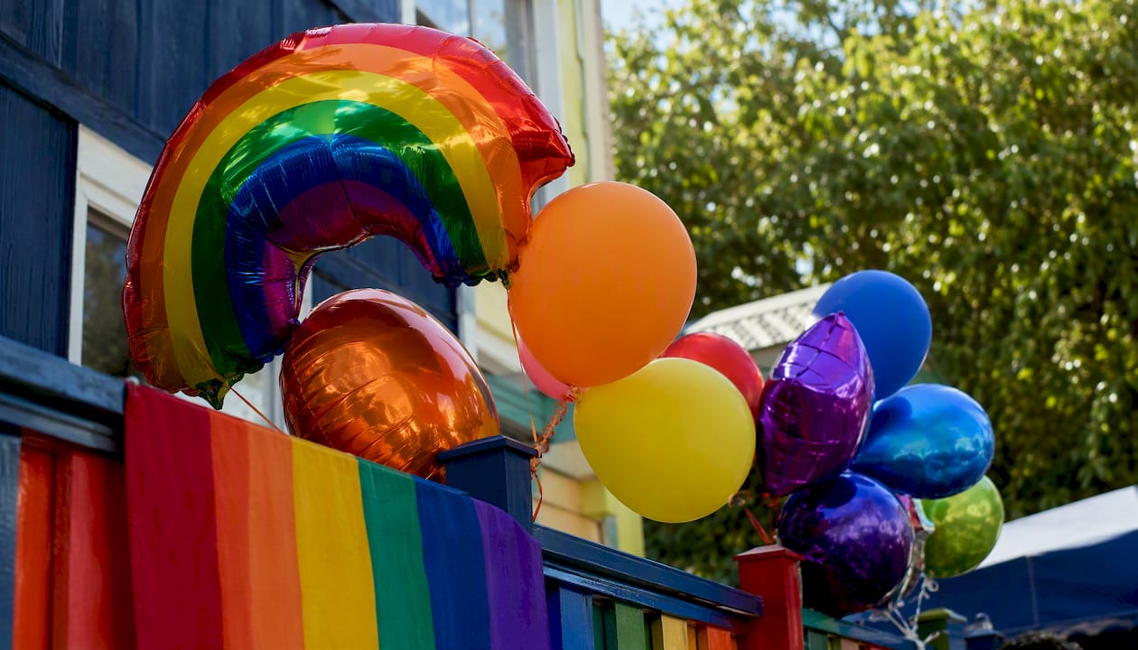 Mixed latex and foil balloons in Pride colors