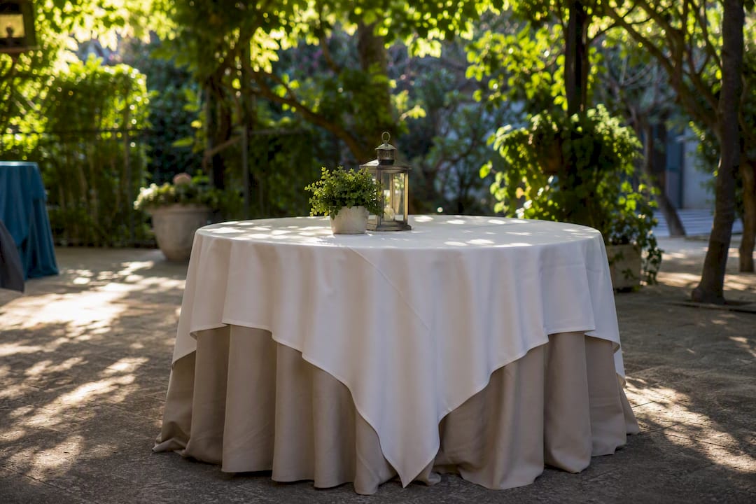Layered round tablecloths showing different drop styles