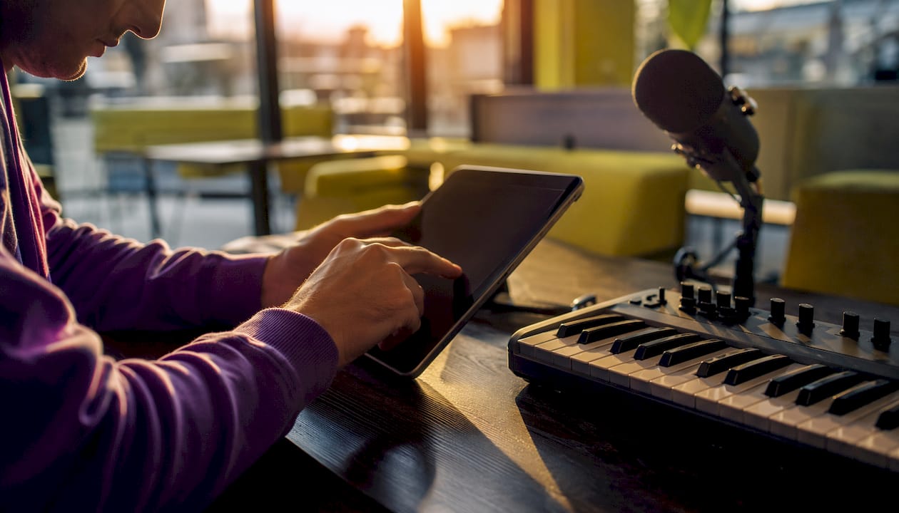 Hands controlling remote audio workflow software