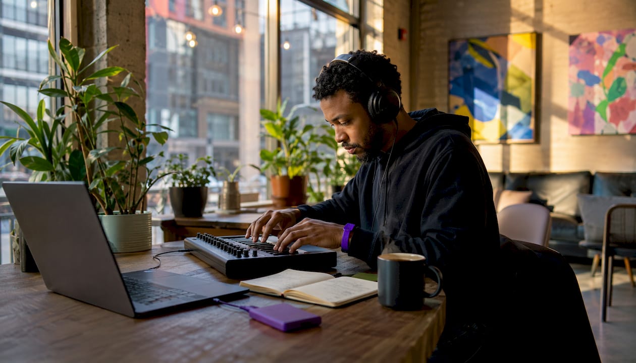 Music producer working with collaboration server hardware