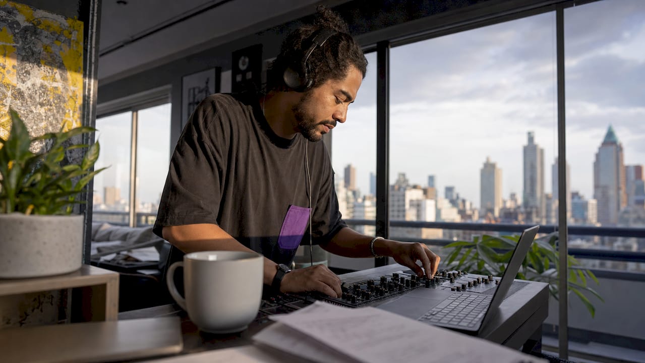 Producer working in home music studio