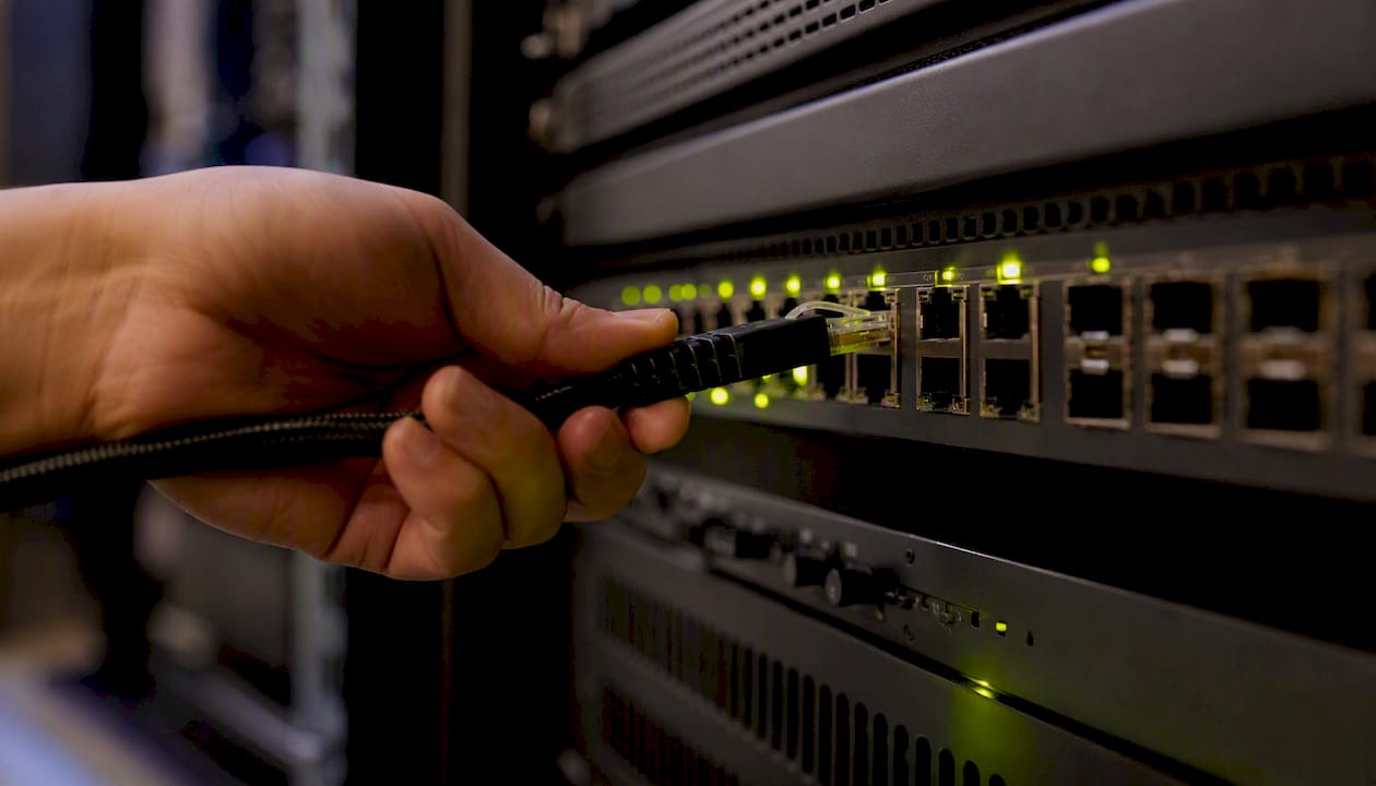 Ethernet cable plugged into studio network switch