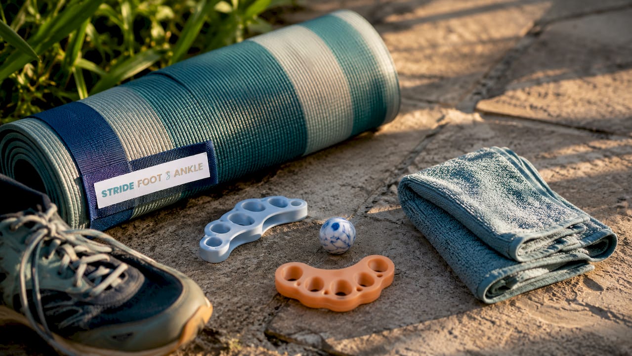 Foot exercise tools on hardwood floor at home
