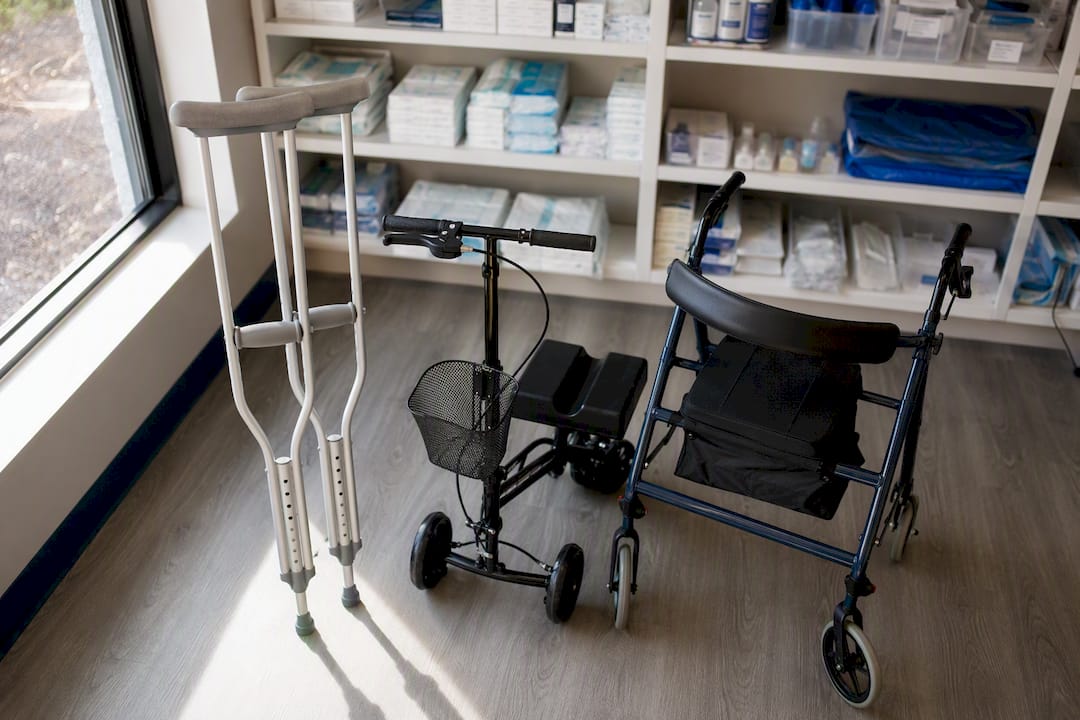 Variety of mobility aids crutches knee scooter walker