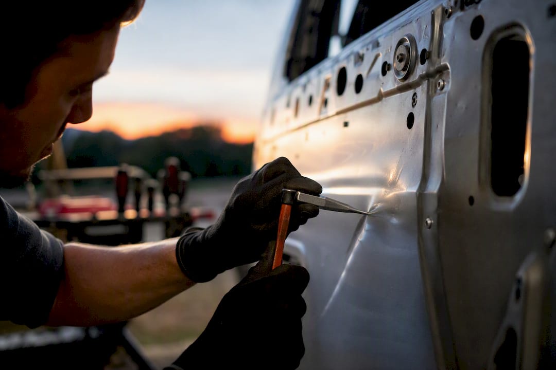 Can a Door Crease Dent Be Fixed? What to Check First 2 Hands Repairing Aluminum Door Crease Dent