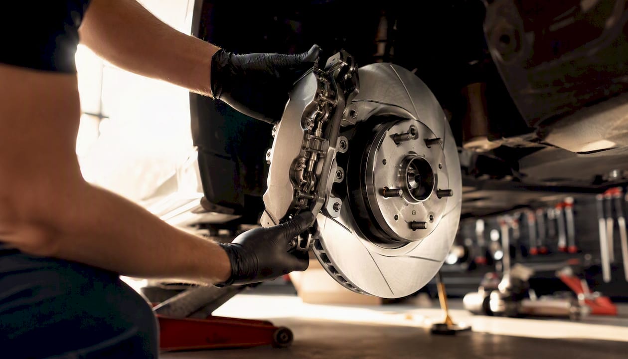 Close-up of a drilled rotor and brake caliper upgrade