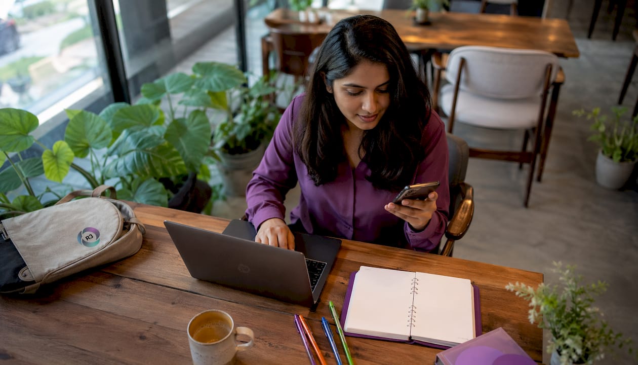 Woman multitasking with virtual assistant tools