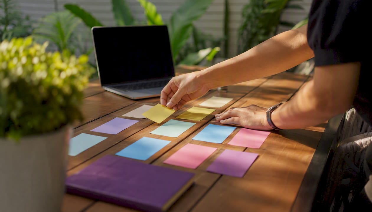 Hands sorting qualification cue cards