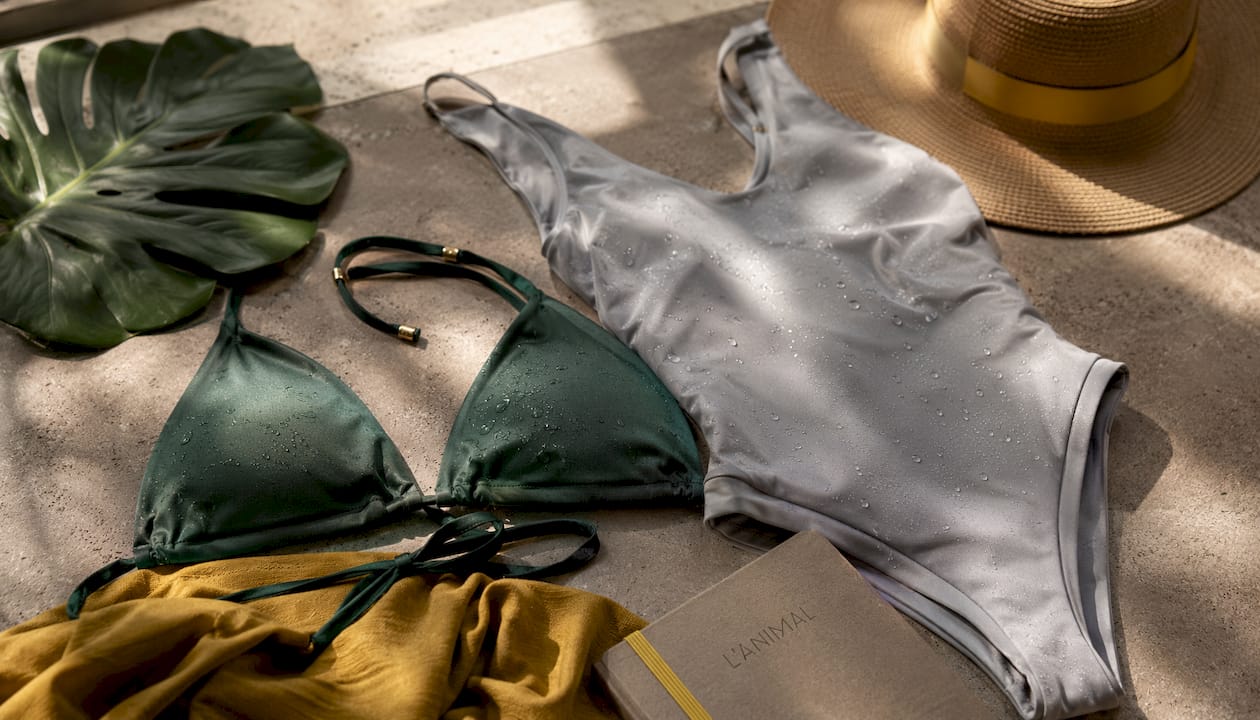 Flat lay of tropical fast-drying swimwear fabrics